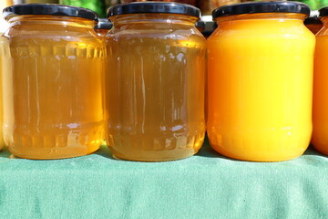 A Beautiful Selection of Assorted Jars of Honey in a Variety of Colors and Flavors