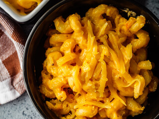 Delicious Homemade Cheddar Mac and Cheese in a Bowl with Creamy Sauce and Tasty Noodles