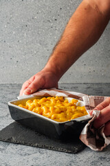 Delicious Homemade Cheddar Mac and Cheese in a Bowl with Creamy Sauce and Tasty Noodles