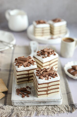 No-Bake Chocolate Biscuit Cake. Cup of coffee and white background. 