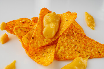 Crunchy Cheese Nachos with Spicy Chilli on a White Background Perfect for Snack Time