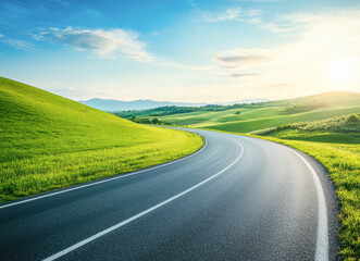 Serene curving road through lush green hills under a bright sunny sky