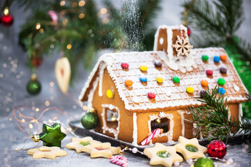 Homemade Christmas gingerbread house with holiday decorations