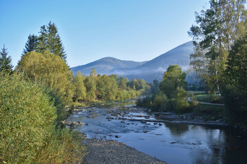 Mountain landscape with river in the morning.