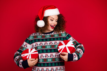Photo of pretty young woman candy giftbox empty space wear christmas festive sweater isolated on red color background