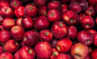 Ripe red apples top view background 