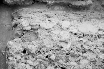 Close-up of ancient stone wall texture in Byblos Citadel, Lebanon. Highlights the raw, historic craftsmanship of Lebanon’s vernacular architecture and heritage