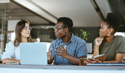Speaking, planning or business people on laptop in startup for review, feedback or brainstorming....