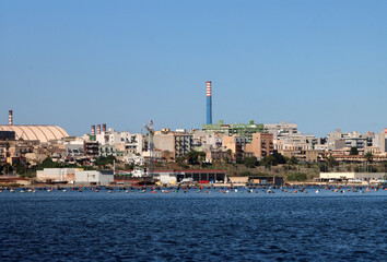 Ilva (now ArcelorMittal) steelworks company with neighborhood Tamburi of Taranto, Puglia, Italy 