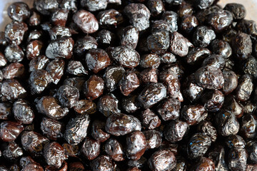 Fried black olives, typical food from Puglia, Italy