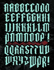 An uppercase gothic alphabet with angular diamond shaped characters and median spur alternates.