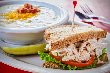 chicken salad sandwich with lettuce and tomato