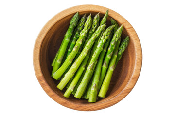 Fresh Asparagus in wooden bowl from top view isolated on background, flat lay view of freshness salad vegetables for health.