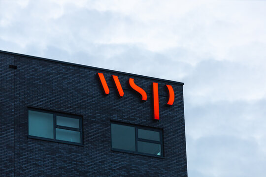 WSP logo sign on the building. WSP is a globally services firm providing strategic advisory, engineering and design services. Nieuwegein in the Netherlands. 4 May 2023. 