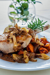 French cut pork chop with sautéed mushrooms