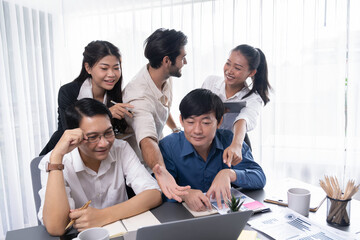 Group of diverse office worker employee working together on strategic business marketing planning in corporate office room. Positive teamwork in business workplace concept. Prudent