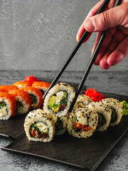 Fresh Sushi Rolls with Salmon and Tuna, Japanese Cuisine on a Gourmet Seafood Plate