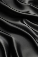 Fototapeta premium Black satin fabric close-up