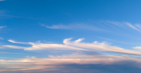 A beautiful clear sky with wispy clouds, perfect for nature lovers and outdoor enthusiasts.