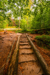 Hiking to Maria or Mariina skala wooden viewpoint built on a rock. It offers a beautiful view of the town of Jetrichovice in Bohemian Switzerland