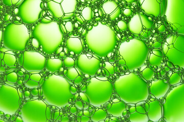 Macro close up of water bubbles with copy space on green background