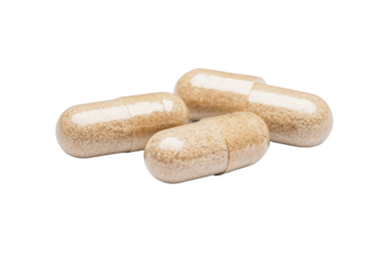 Three dietary supplement capsules on a white isolated background.