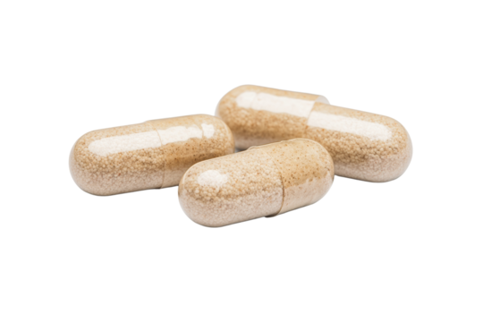 Three dietary supplement capsules on a white isolated background.