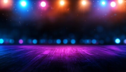 Obraz premium Vibrant stage lights shining in various colors over a wooden floor, creating a lively atmosphere perfect for performances.