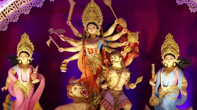 Colorful sculpture of Bangali Goddess Durga and other goddesses in Durga Puja festival celebration, ritual, Happy Navratri. Hindu mythology. 
 
