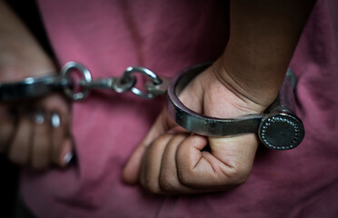 hands with handcuffs