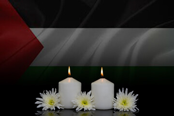 photo of beautiful flowers  and candles on black background