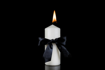 photo of beautiful flowers  and candles on black background