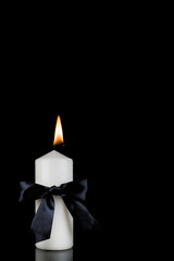 photo of beautiful flowers  and candles on black background