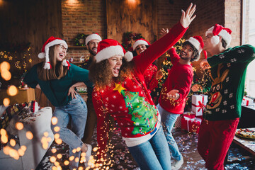 Photo of nice young people enjoy dancing good mood have fun cozy christmas decoration interior...