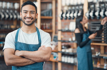 Portrait, business owner and asian man with arms crossed for coffee shop, professional and pride for job. Smile, male person and happy barista in cafe for hospitality, customer service and confidence