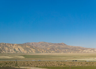 Sunny view of the rural highway landscape