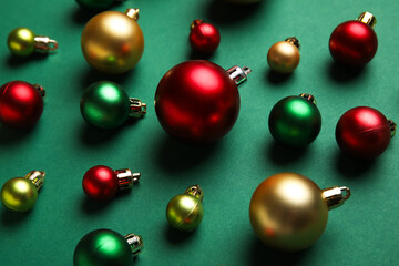 Christmas balls on green background