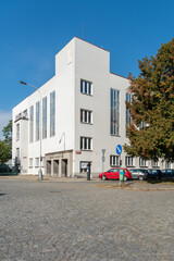 Fototapeta premium Building of Hus's choir in Nusle was designed in 1934 as a multi-purpose building. It is a relatively simple rectangular building with a slightly raised prismatic turret on the street corner.