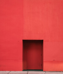 red door in a wall coral gables street 