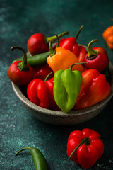 Colorful peper on green background