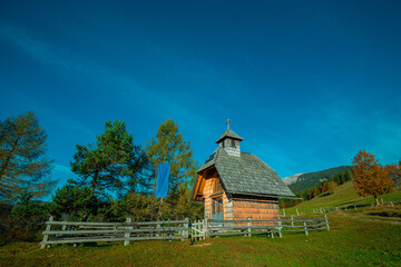 Small chapel or church on the plateau of Uskovnica, pilgrimage church in the green meadows,...