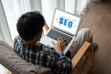 SEO search engine optimization for modish e-commerce and online retail business showing on computer...