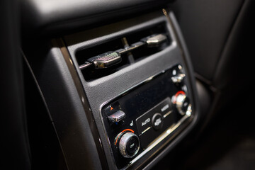 A close up of a car s rear air conditioning system