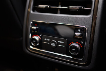 A close up of a car s rear air conditioning system