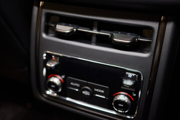 A close up of a car s rear air conditioning system