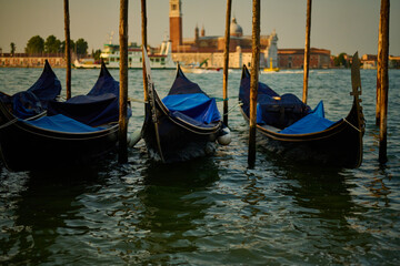 Fototapeta premium Venice and its canals,gondolas and ancient buildings 