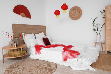Interior of festive bedroom decorated for Chinese New Year celebration