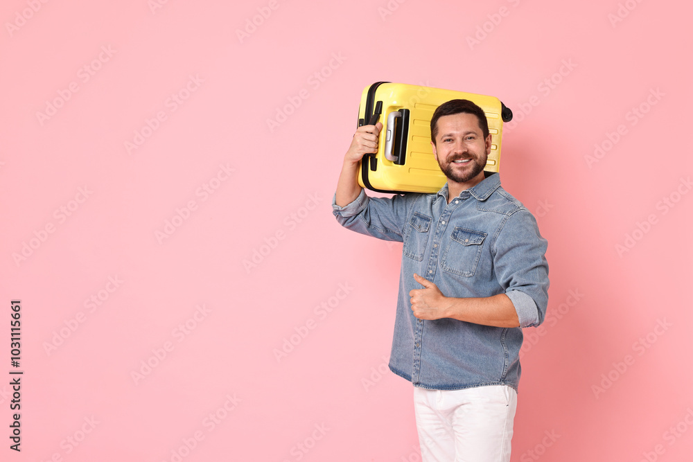 Sticker Happy man with suitcase showing thumbs up on pink background, space for text