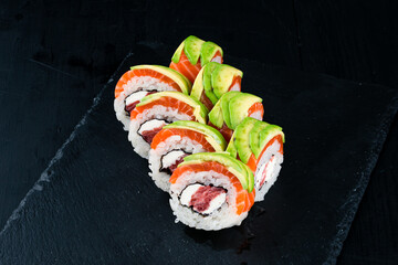 Set of maki sushi rolls with tuna, salmon, cream cheese and avocado. © smspsy