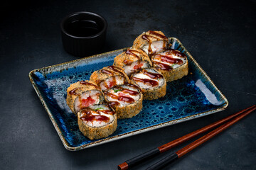 Fried sushi rolls with shrimp, tuna, cream cheese, lettuce and teriyaki sauce.